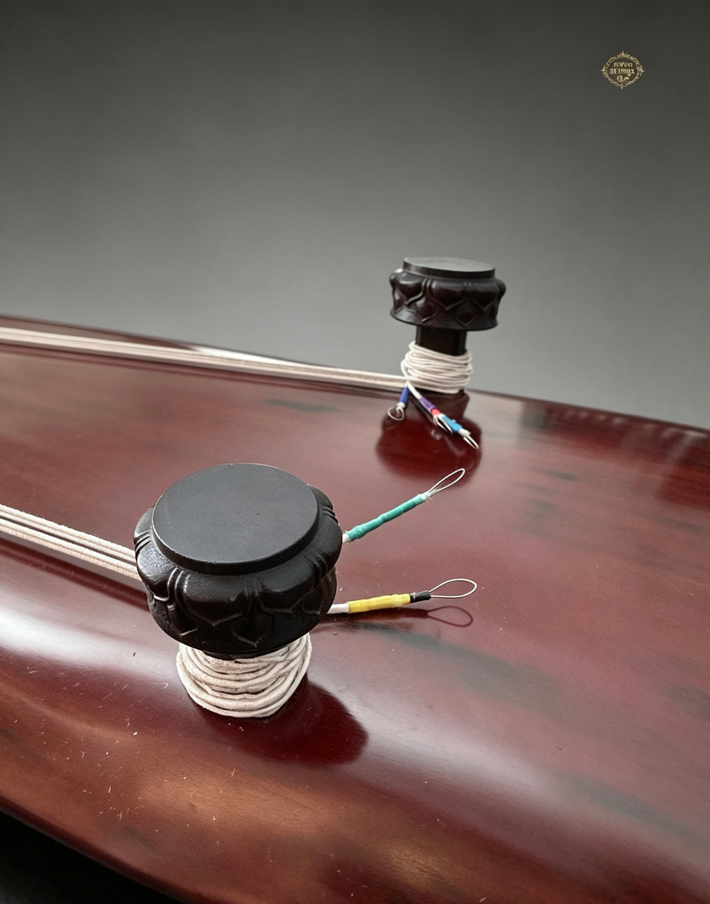 Banana Leaf guqin – side detail with "Seven String Qin" brand engraving