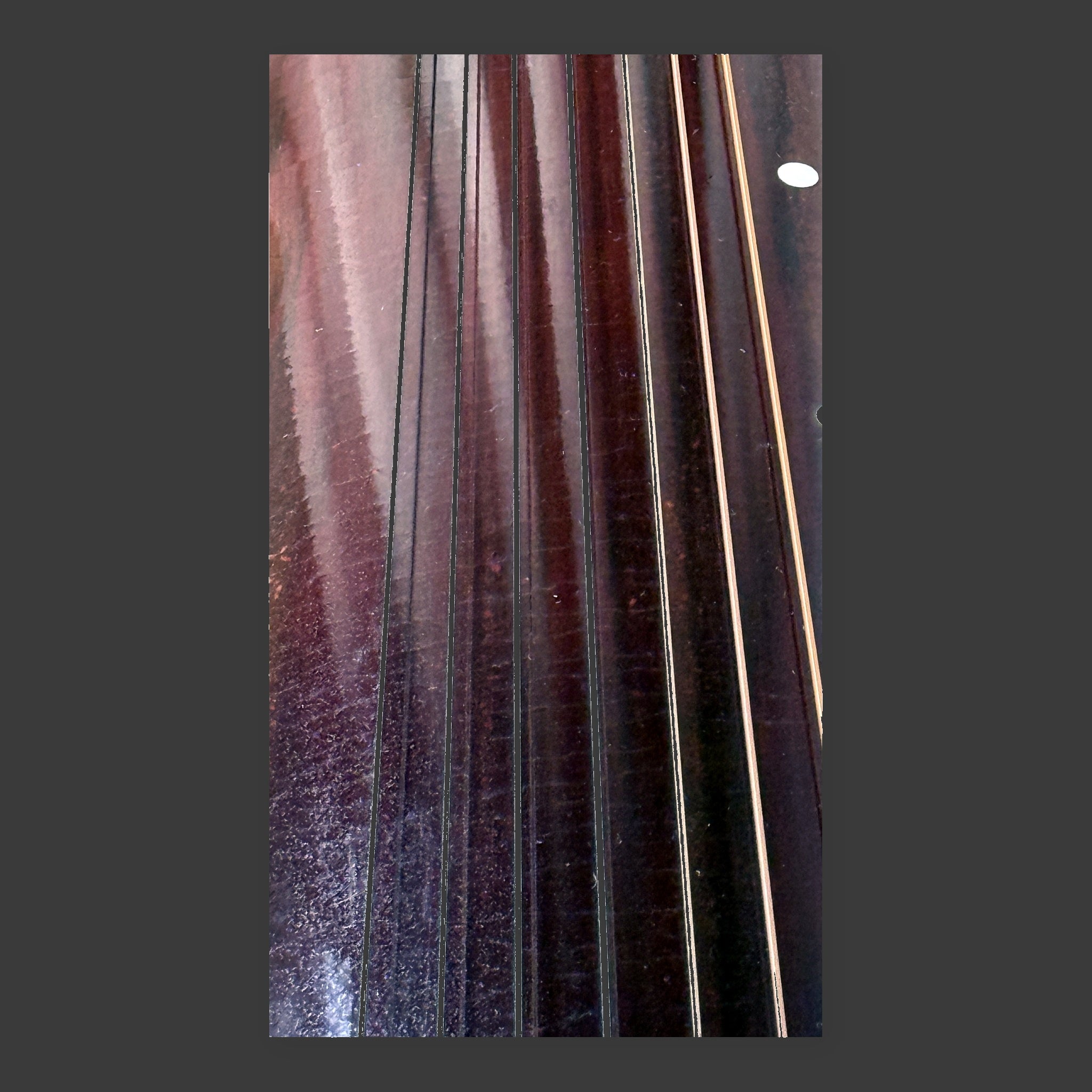 	Jiuxiao Huanpei guqin – close-up of string arrangement at lower end