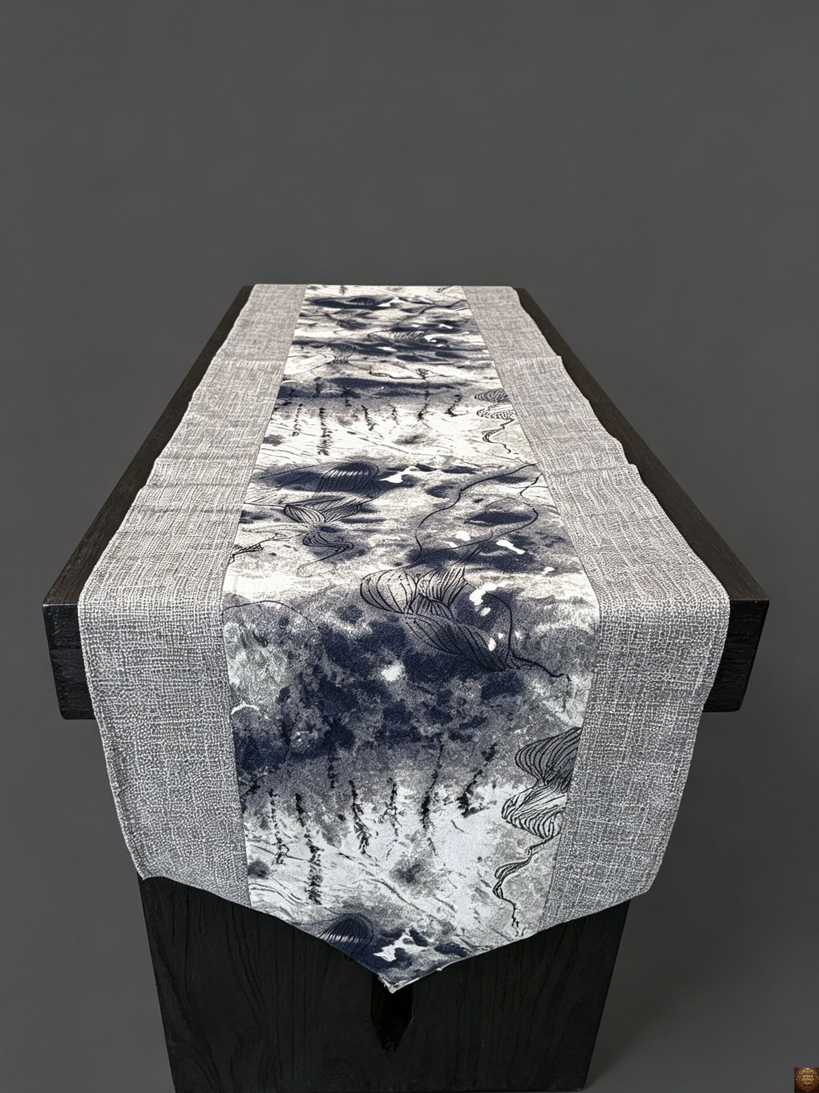 Detachable guqin table – front view with red lacquer guqin placed on black solid wood table, gold-edged corner carvings visible