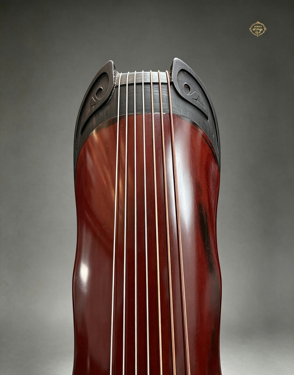 Banana Leaf guqin – tuning peg (轸) detail with silk string wrapping