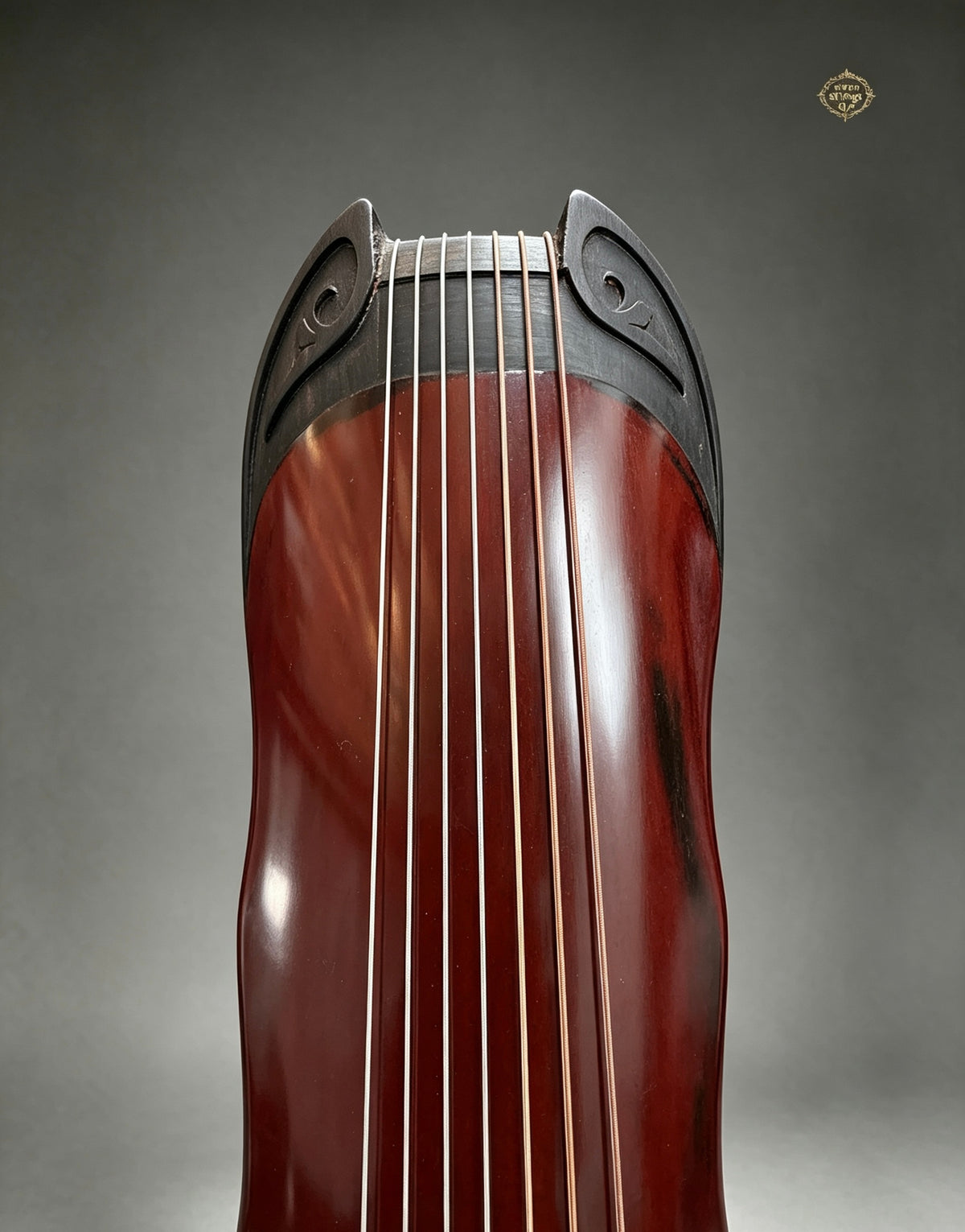 Banana Leaf guqin – tuning peg (轸) detail with silk string wrapping