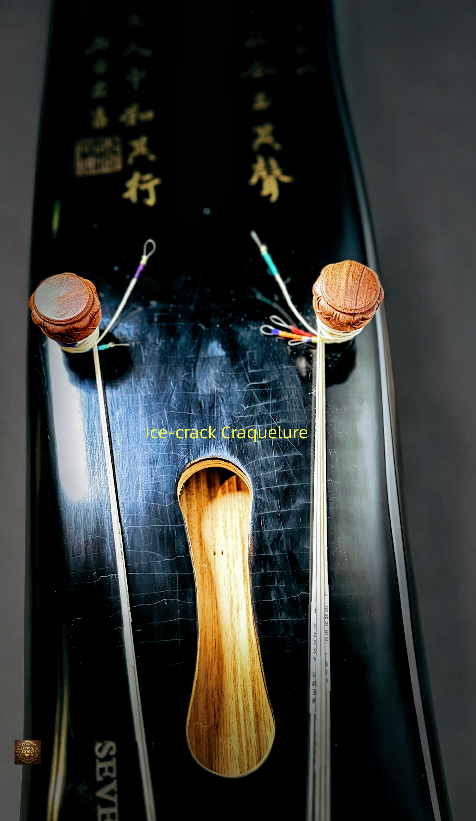 Jiaolin Tingyu Guqin – lower end detail showing ice-crack craquelure lacquer, tuning pegs and colorful silk ties