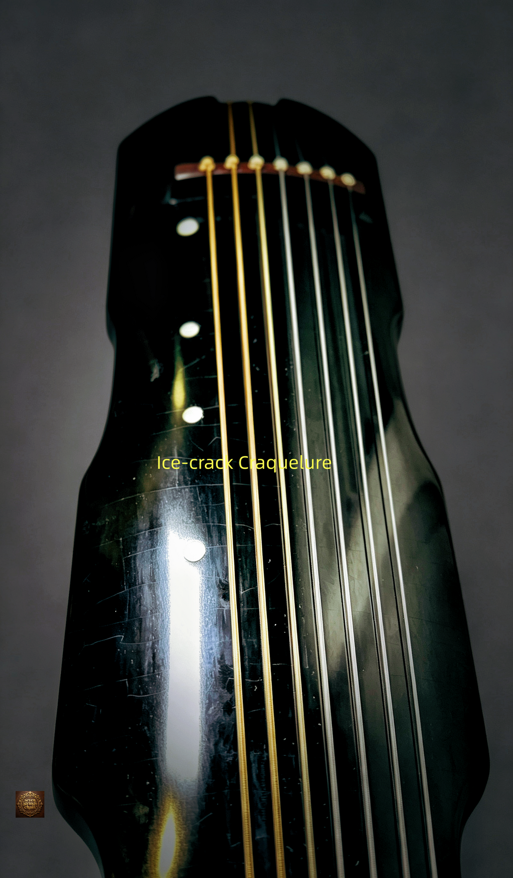 Jiaolin Tingyu Guqin – upper end close-up showing seven strings, hui markers and ice-crack craquelure lacquer